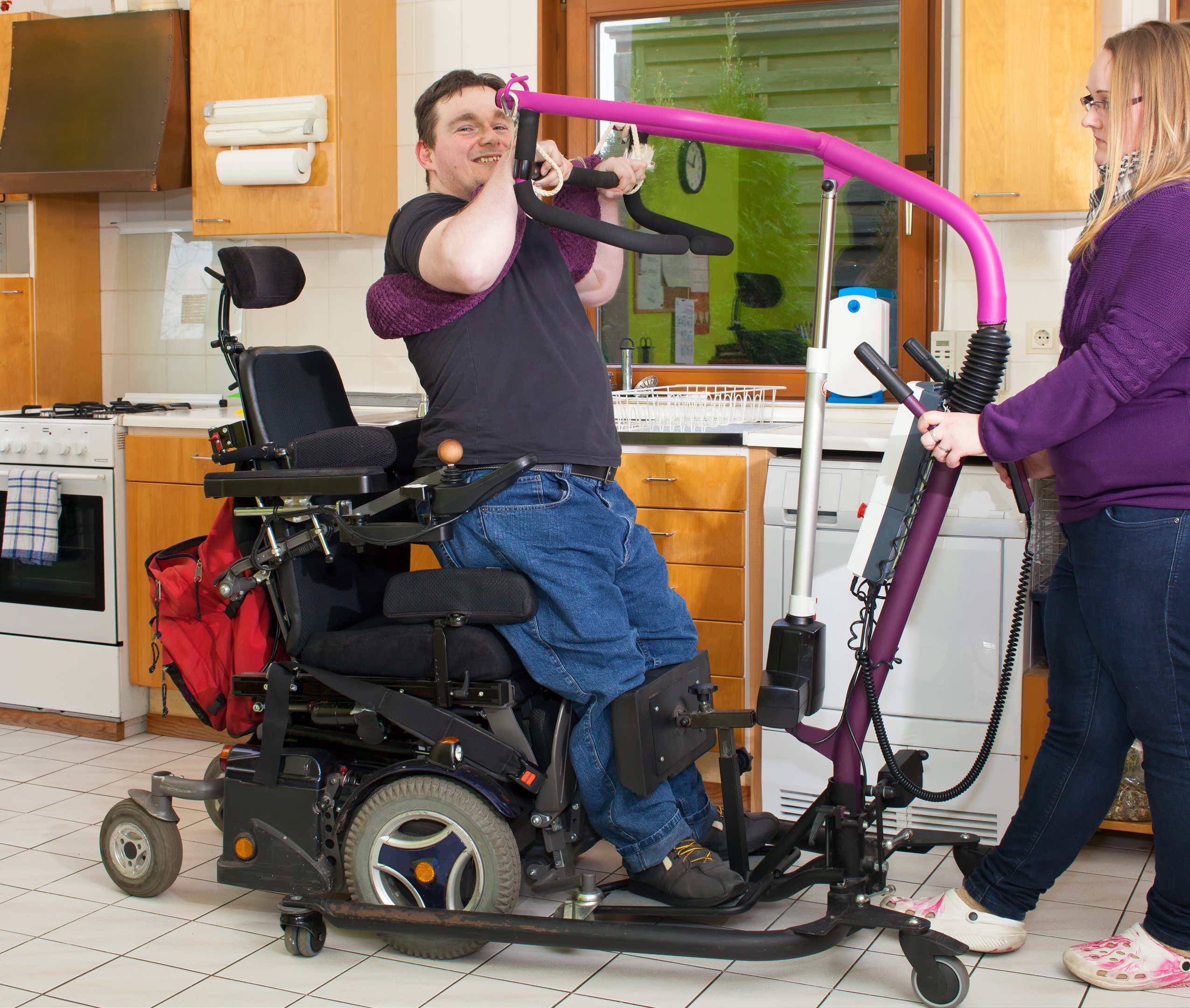 Therapist helping a young cerebral palsy patient.